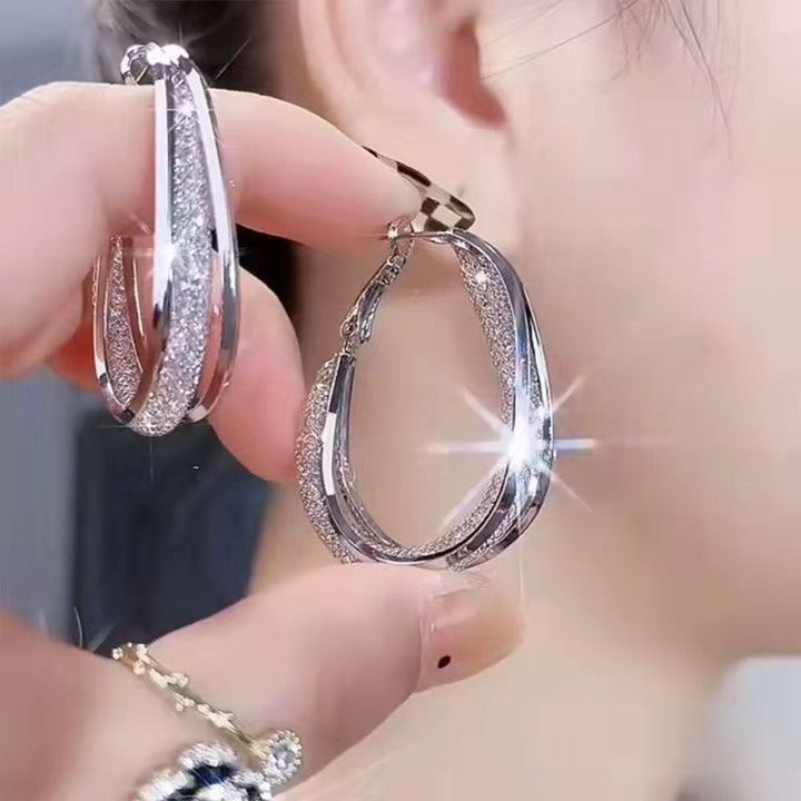 GRACE | Twisted Crystal Oval Hoop Earrings