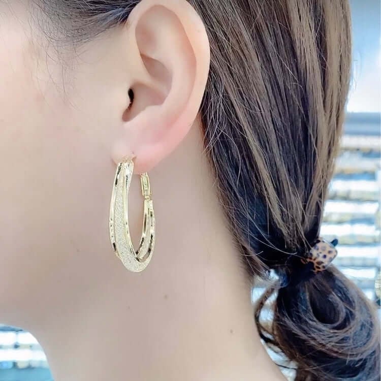 GRACE | Twisted Crystal Oval Hoop Earrings