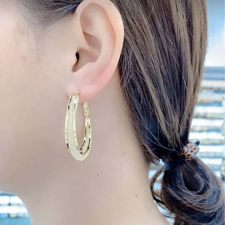 GRACE | Twisted Crystal Oval Hoop Earrings